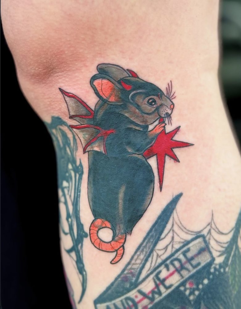 Neo-traditional rat with small devil wings and a red star